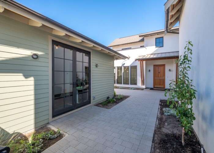 Summerland carriage house entry doors